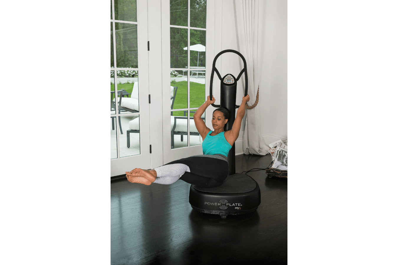Power Plate my5 vibration platform vibrating exercise machine in use