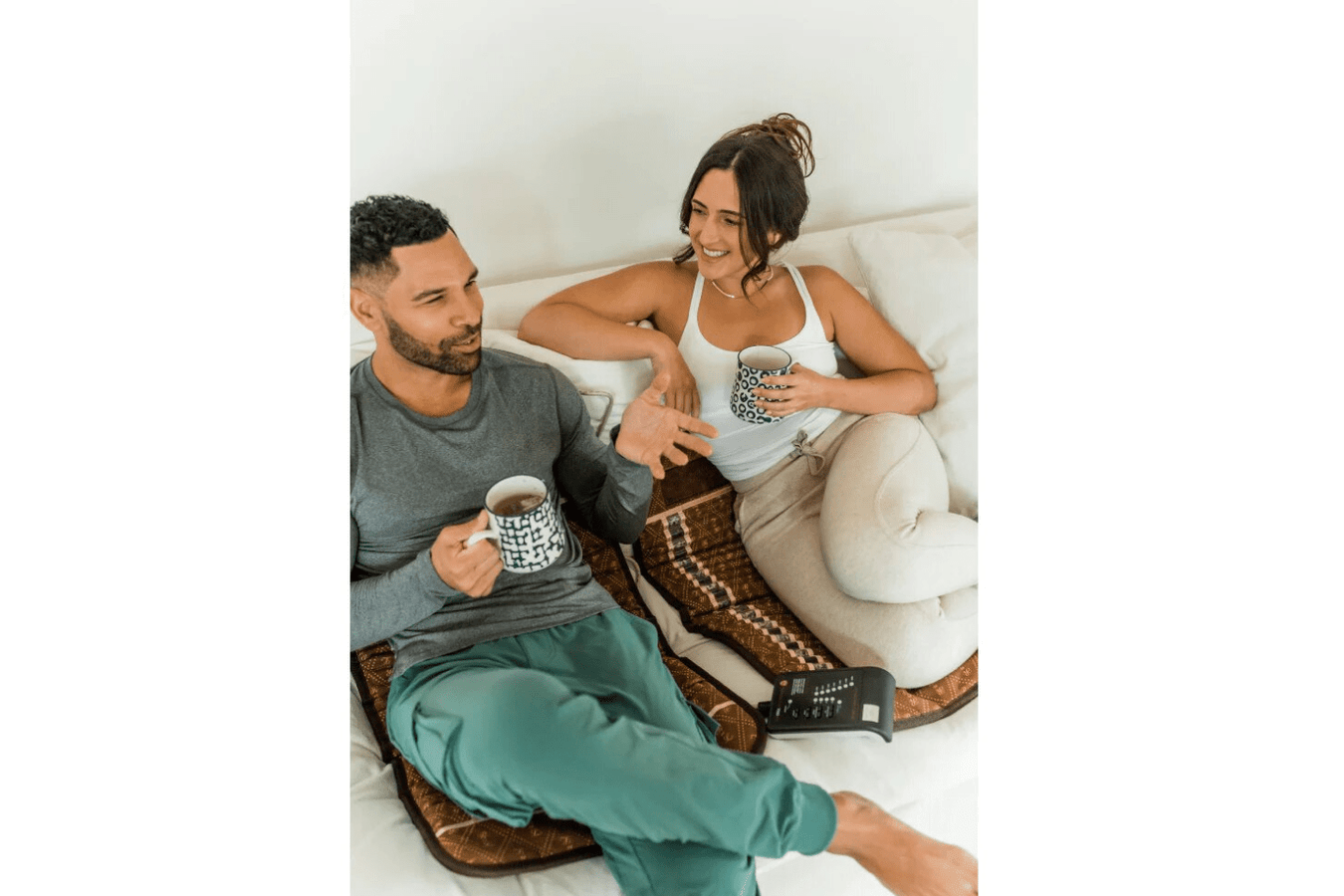 Biomat Mini 7000MX Infrared Mat, couple using the mini biomat
