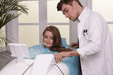 Doctor interacting with a patient in a medical setting
