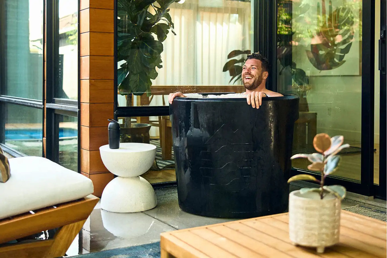 Person Using The Barrel Cold Plunge