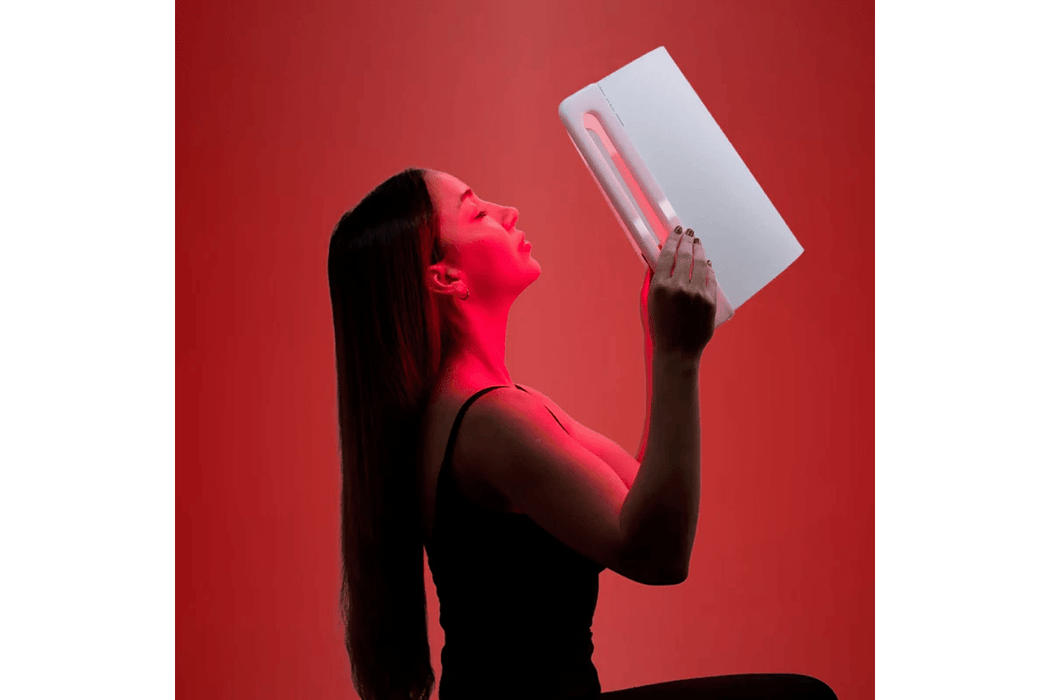 Lady holding a Lumara LED light
