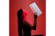 Lady holding a Lumara LED light
