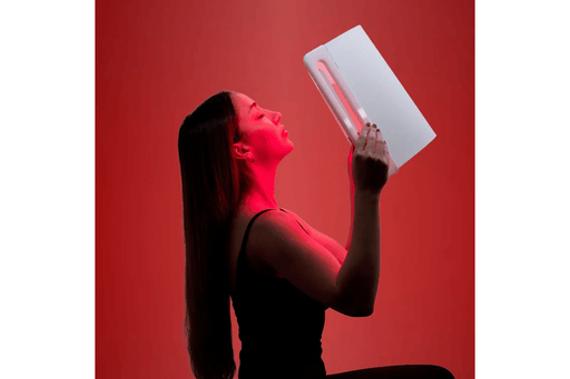 Lady holding a Lumara LED light