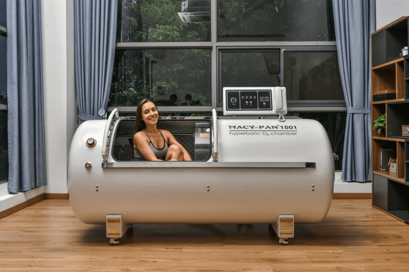 Person enjoying the session with Macy Pan 1501 Hard Shell Hyperbaric Chamber