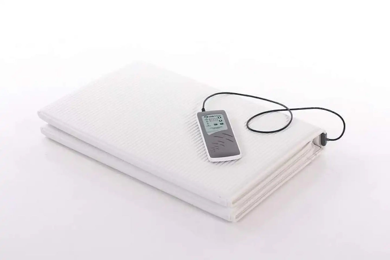 Omi Full Body Mat in folded form with the controller