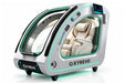 OXYREVO Space60 PRO personal oxygen therapy and wellness device, featuring a silver and black exterior with a clear acrylic dome and a cream-colored interior seat visible through the front window.