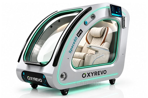 OXYREVO Space60 PRO personal oxygen therapy and wellness device, featuring a silver and black exterior with a clear acrylic dome and a cream-colored interior seat visible through the front window.