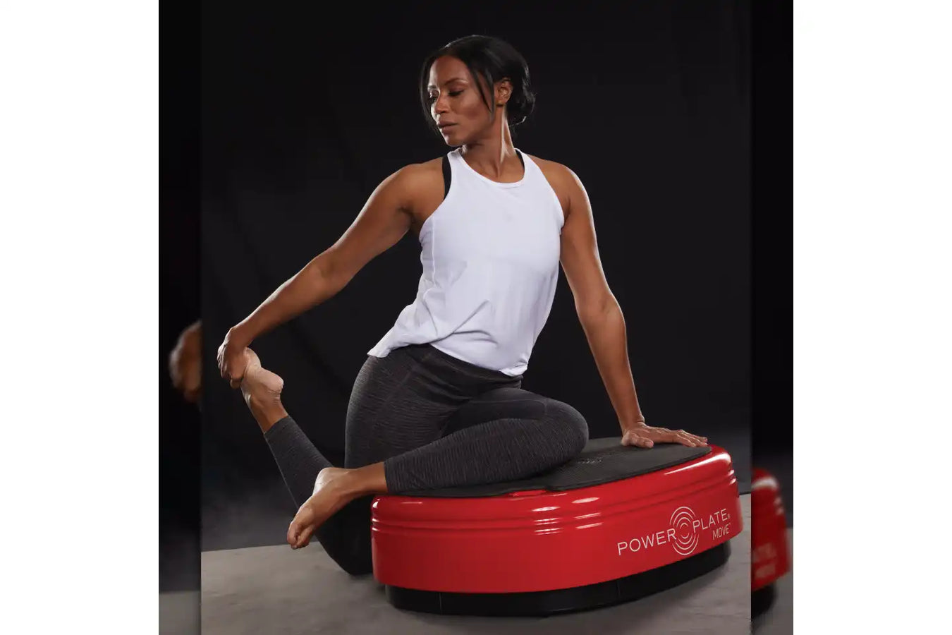 Person using the Power Plate Vibration Plate