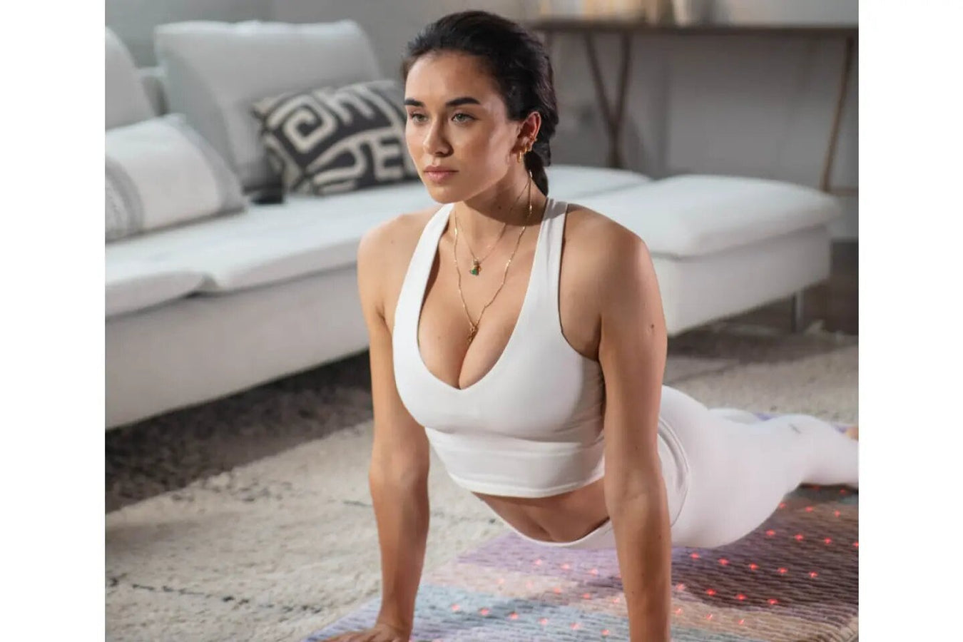Woman doing yoga using the Healthyline Rainbow Mat