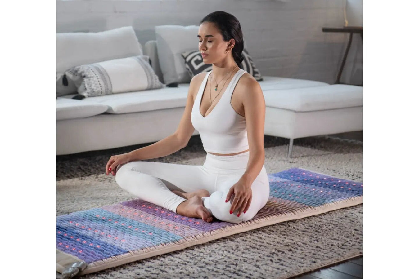 Person meditating using the Healthyline Pemf Mat Large