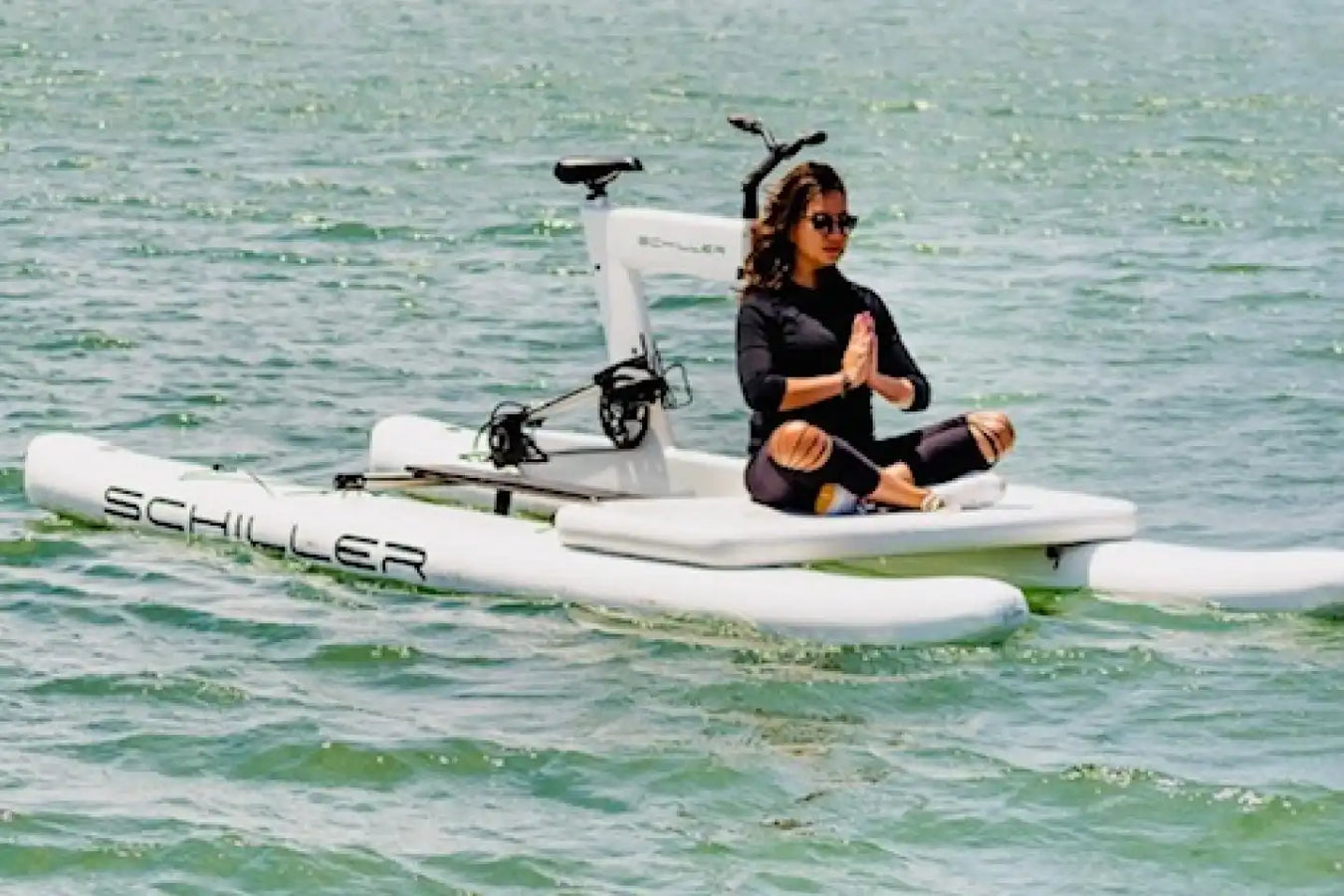 Person doing yoga on Schiller Water Bicycle