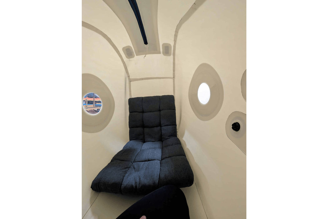 Interior view of Newtowne Hyperbaric Chamber - Seated Shoe with two large windows and comfy foam