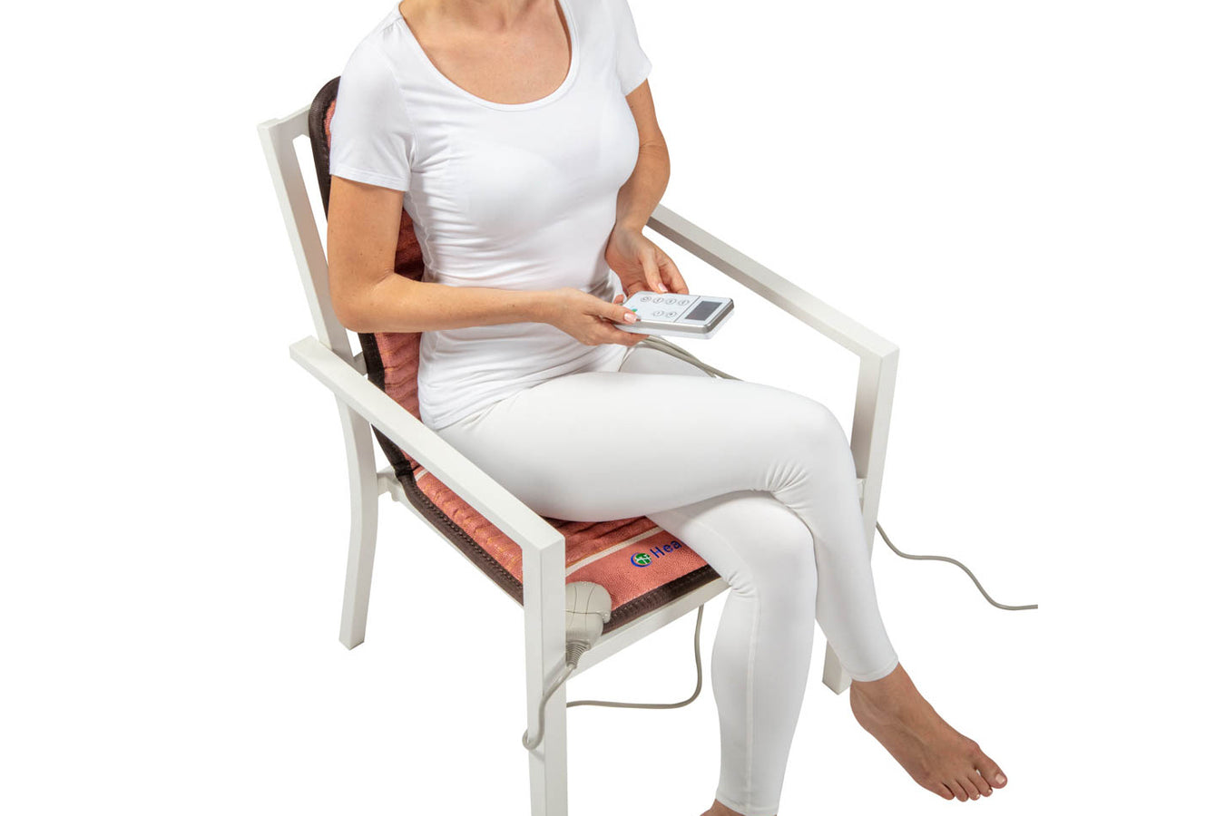Person Using The Healthyline Inframat Pro, Sitting On The Chair