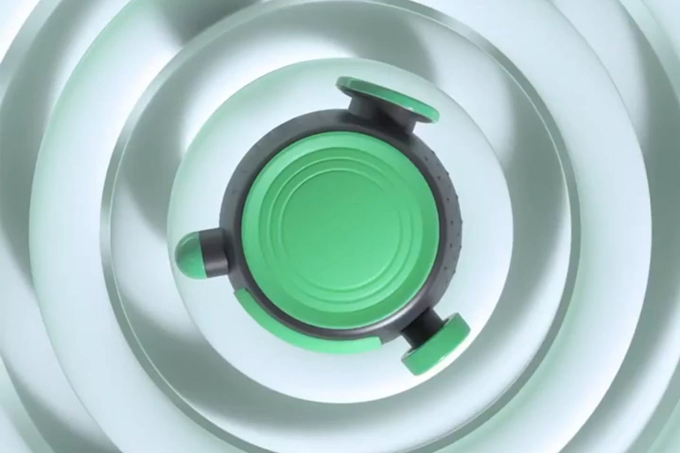 Top view of the Rapid Release Pro3+ treatment disk over a spiral ripple graphic