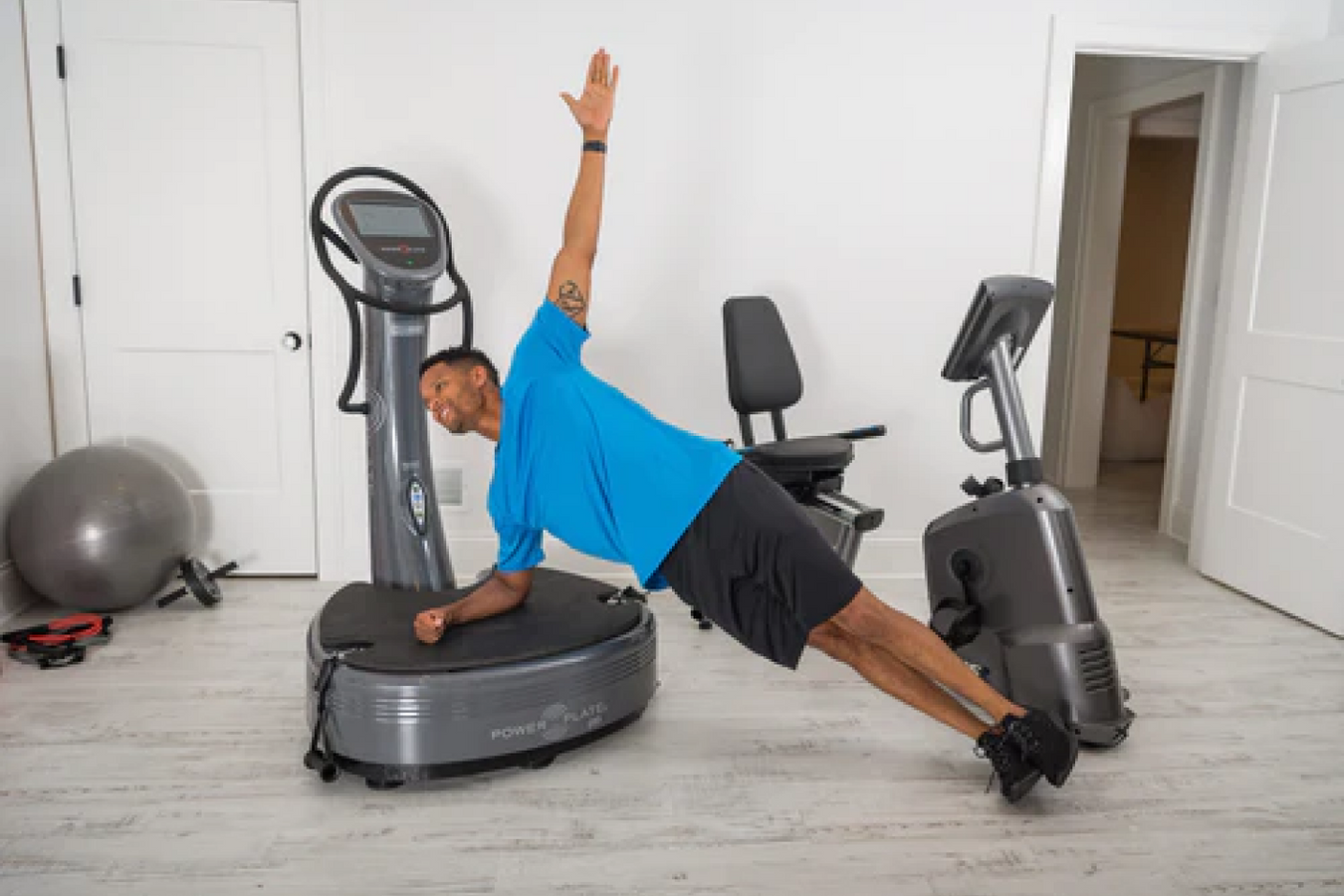 Power Plate Machine with touch screen LCD in action