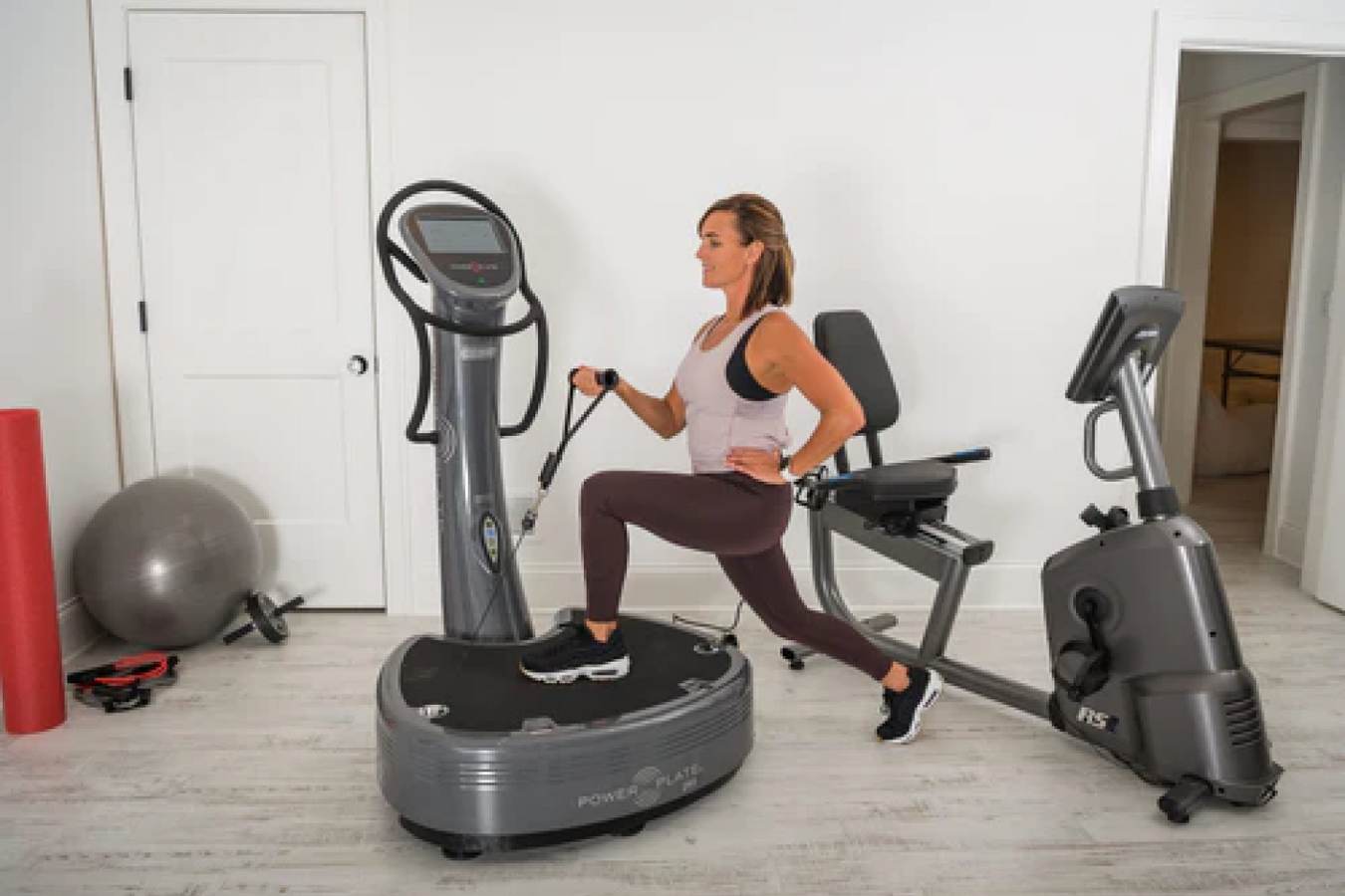 Power Plate Vibrating Exercise Machine in operation