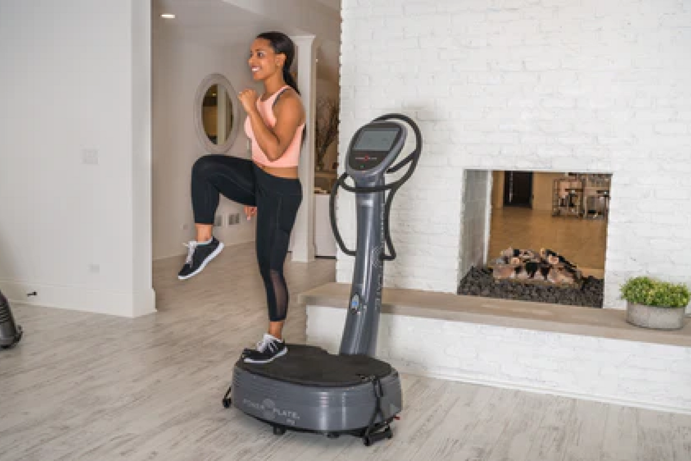Person enjoying workout in the Power Plate Vibro Plate