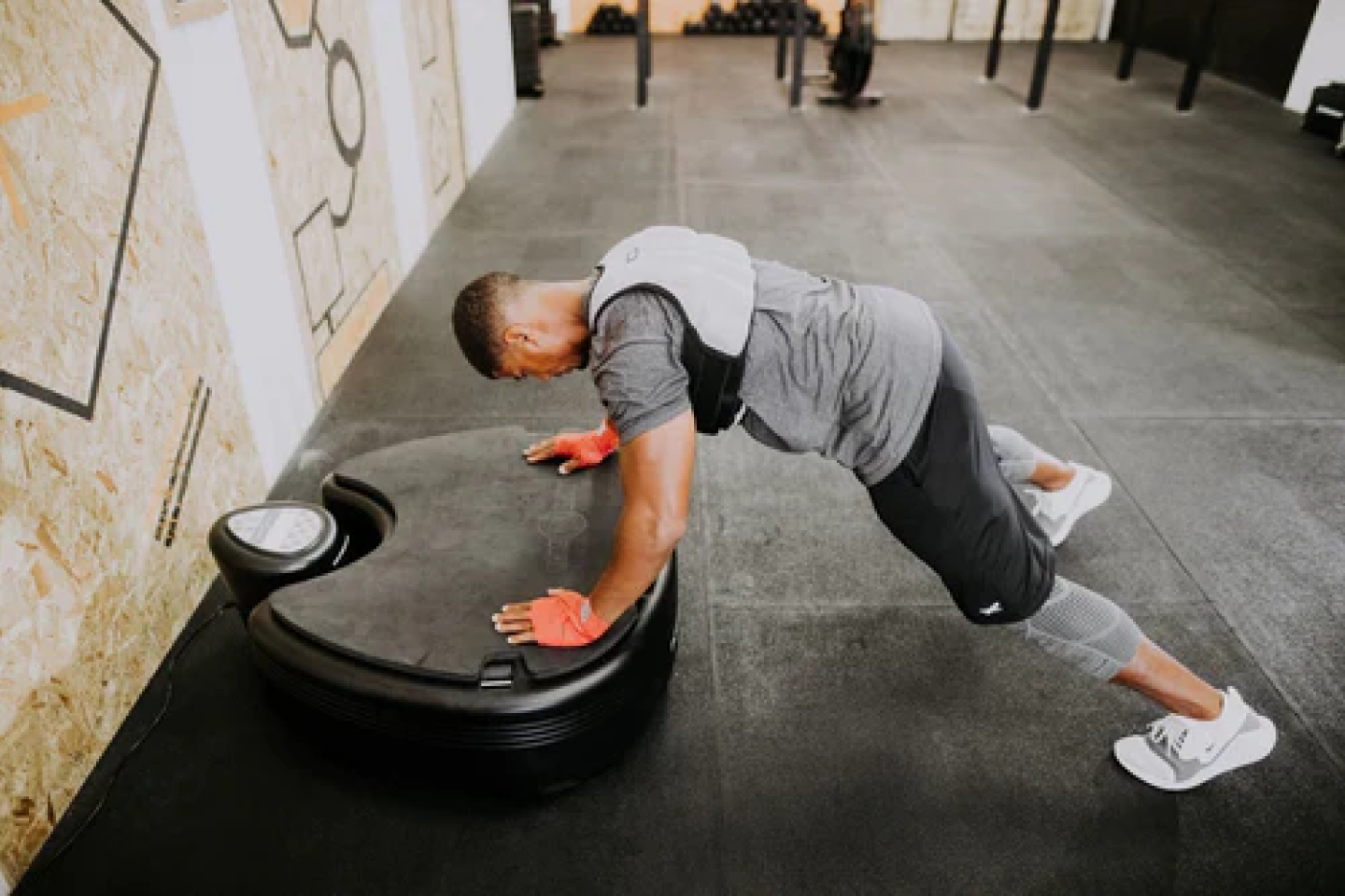 Person working out in the Power Plate Whole Body Vibration Machine