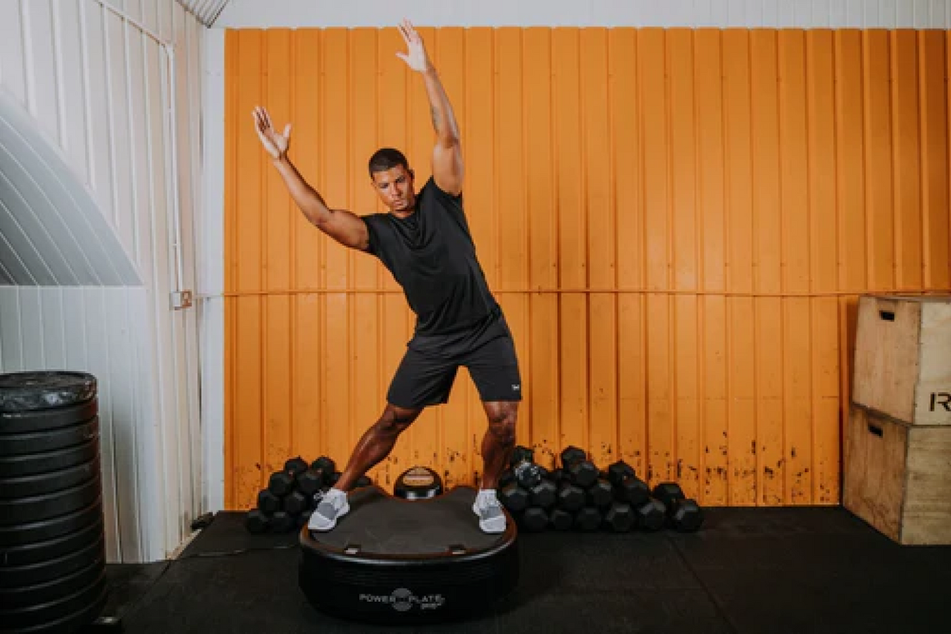 Man enjoying workout in the Power Plate Vibro Plate 