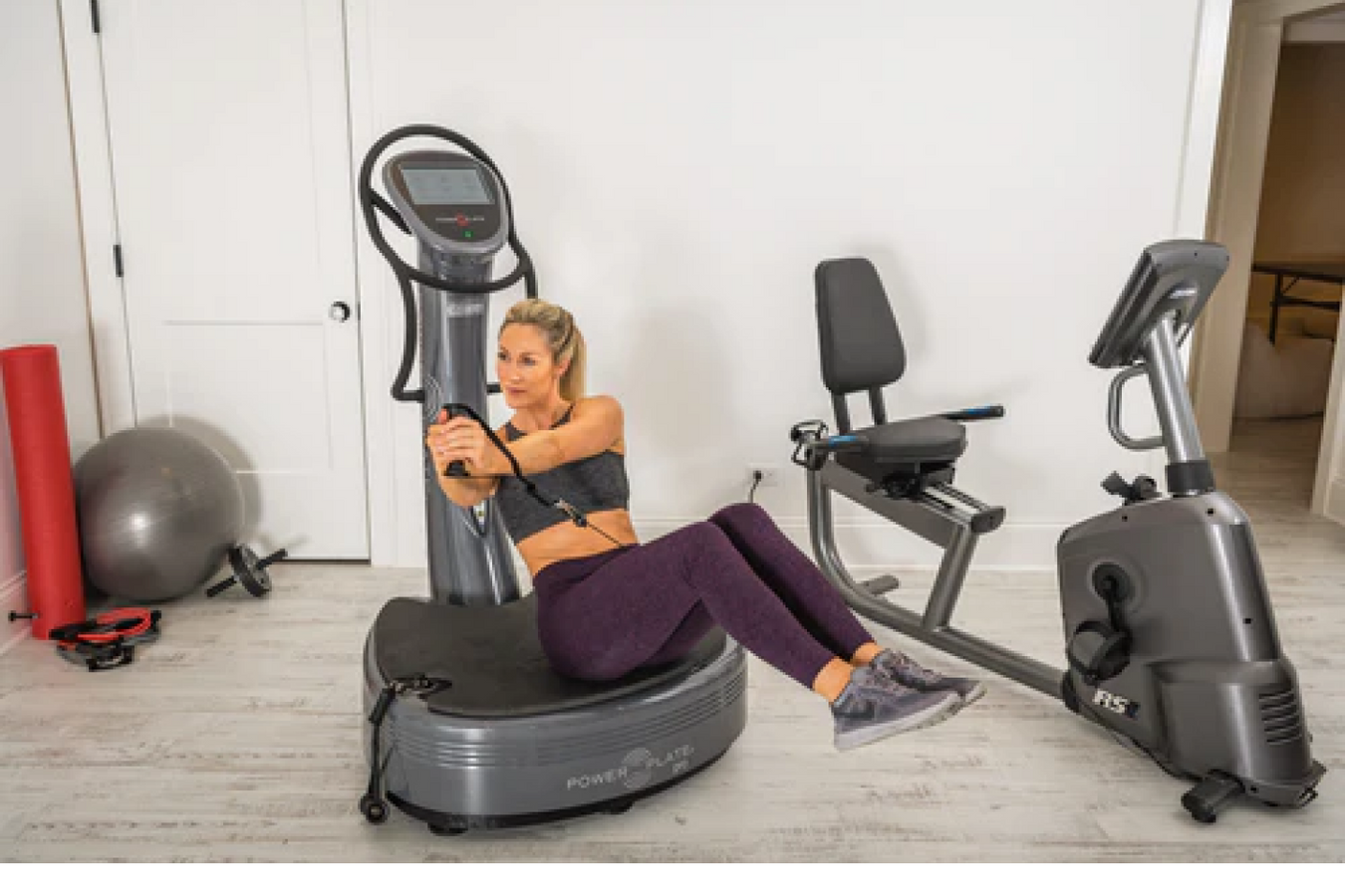 Person working with the Power Plate Power Plate Machine