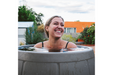 Person enjoying the Ice Bath Barrel outdoor